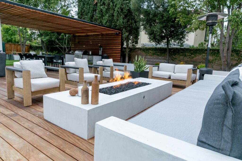 A pergola with a fire pit
