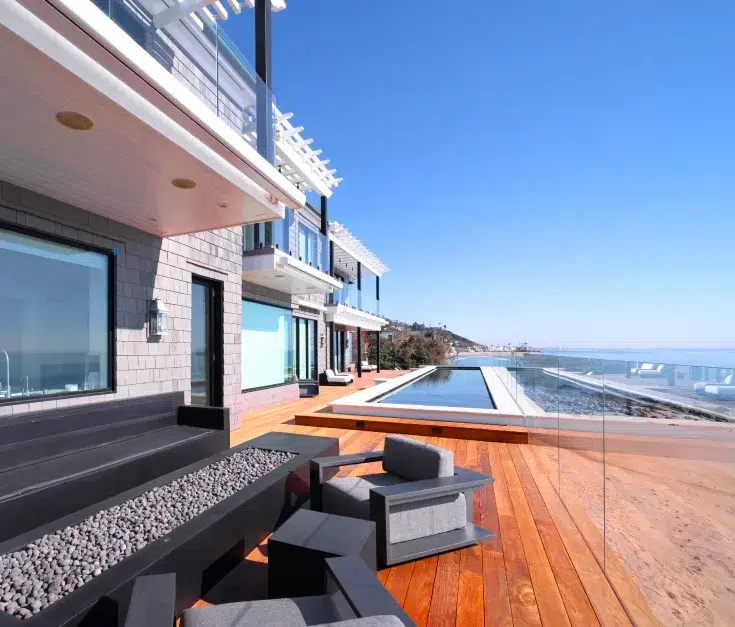 Beach house deck project in Los Angeles to surround patio and pool