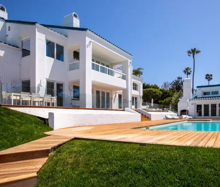 White house with a deck project in Los Angeles around the pool