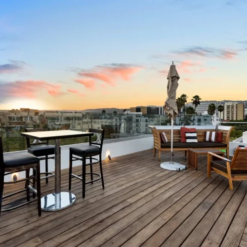 Commercial deck construction company building a large-scale outdoor deck Roof terrace decking offering a relaxing space with scenic vistas.
