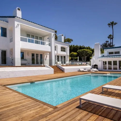 Malibu ipe deck with pool in a backyard.
